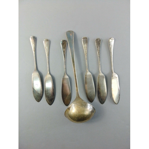 82 - Small silver plated lot comprising ladle and six butter knives as well as an aluminium coffee jar an... 