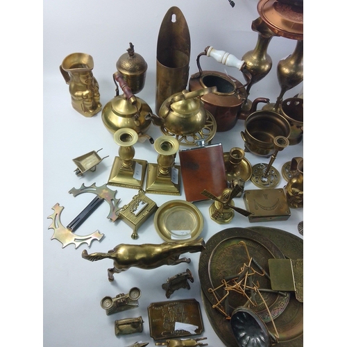 88 - A substantial lot of brassware to include trays, carriage clock, trivets, kettles, toby jugs, decora... 