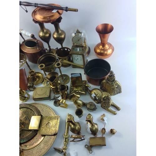 88 - A substantial lot of brassware to include trays, carriage clock, trivets, kettles, toby jugs, decora... 