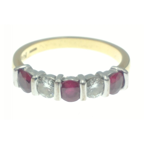 13 - Stunning Ruby and Diamond ring. Yellow and white gold bar set five stone ring comprising three rubie... 