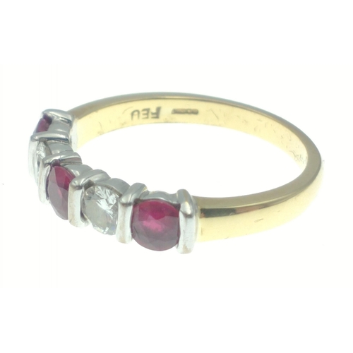 13 - Stunning Ruby and Diamond ring. Yellow and white gold bar set five stone ring comprising three rubie... 