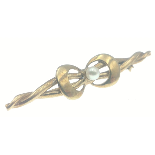 15A - A pretty hallmarked gold bar brooch with bow set with seed pearl, 5cm approx, gross weight 3.12g app... 