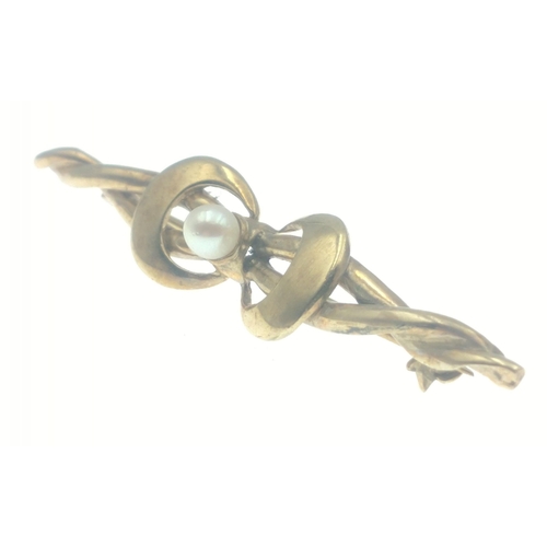 15A - A pretty hallmarked gold bar brooch with bow set with seed pearl, 5cm approx, gross weight 3.12g app... 