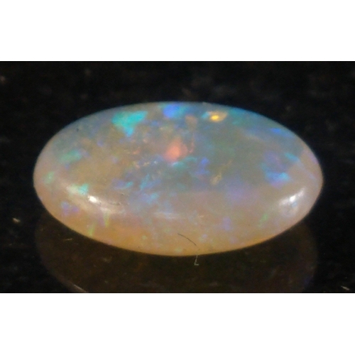 15J - OPULENT OPAL stone - An oval cut rainbow COOPER PEDY opal gifted to the vendor on his birthday in 19... 