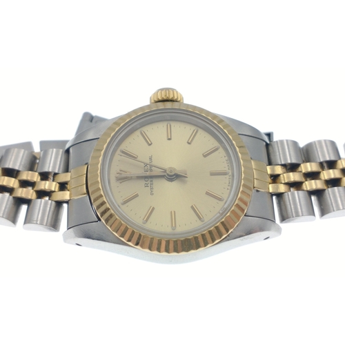 16 - A ladies ROLEX OYSTER watch 18mm dial, model number 67193 with outer box and papers purchased from W... 