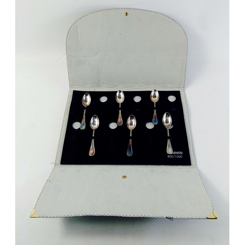 20 - A set of six teaspoons stamped 800 ARGENTO.  Weight 73g approx.  In soft case.#34