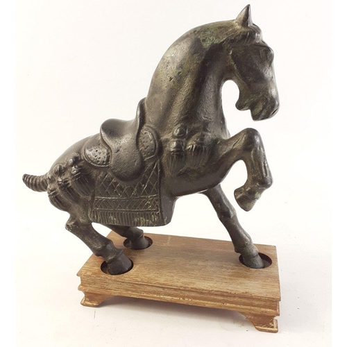 204 - A very striking bronze Chinese style war horse on wooden plinth. Stands 22cm tall approx#224