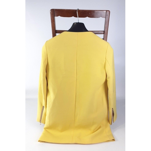 307 - A ZARA WOMAN zip-up jacket in a cheerful yellow, size small.  Stain on one sleeve#330