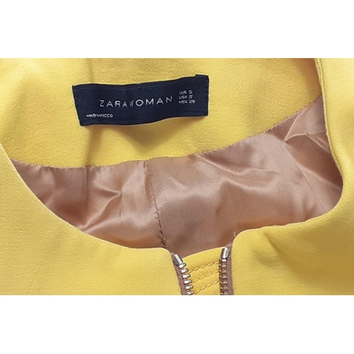 307 - A ZARA WOMAN zip-up jacket in a cheerful yellow, size small.  Stain on one sleeve#330