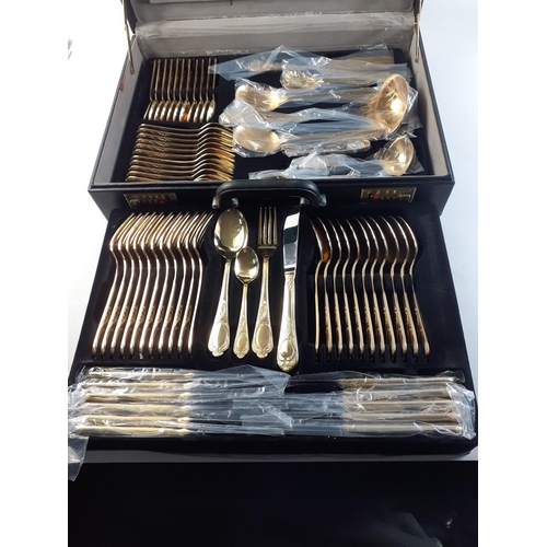 37 - A large set of heavyweight 24kt gold-plated EDELSTAHL ROSTFREI cutlery in a briefcase with combinati... 