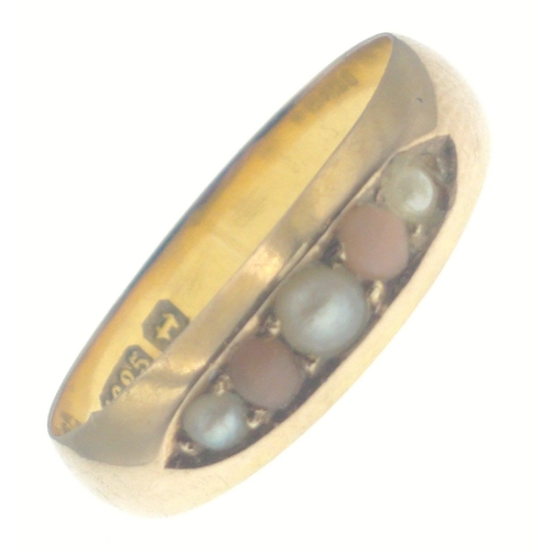 4 - A 15Kt. 625 stamped gold band with 3 seed pearls and 2 pink stones, size O, gross weight 2.20g appro... 