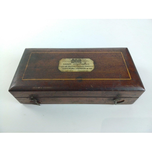 407 - An antique SIKE'S hydrometer in mahogany box.  Appears to be complete#430