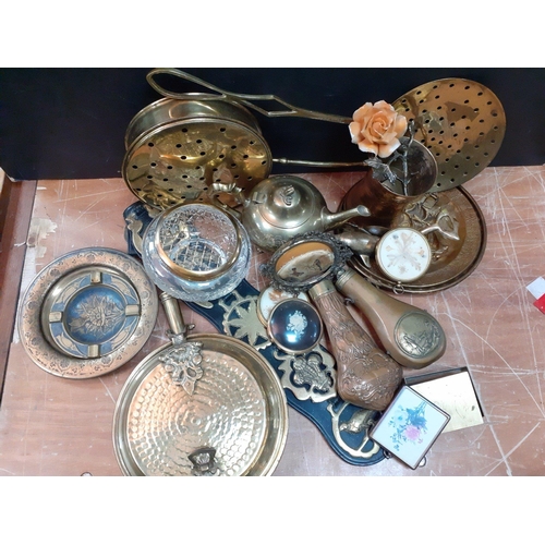 42 - A large collection of BRASSWARE to include bed pan warmers, powder flasks, miniature picture frames,... 