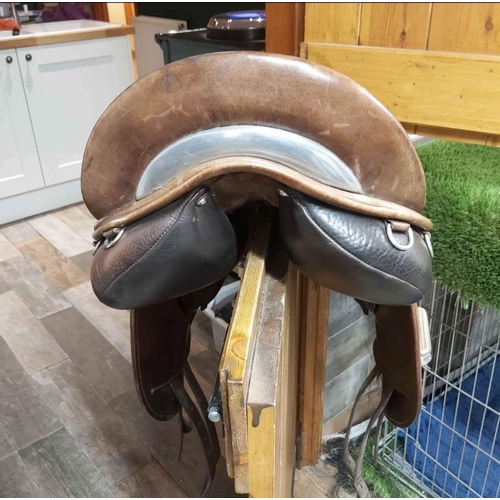 268 - Brown WOW branded leather saddle fully adjustable, with stirrup leathers & irons  - this belonge... 