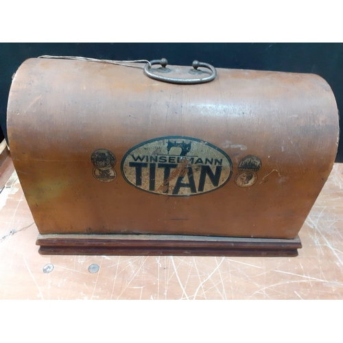 297 - A TITAN Winselmann wooden cased hand crank sewing machine in nice condition#107