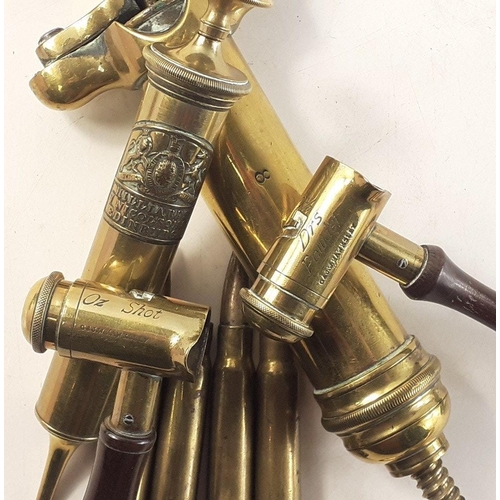 76 - A superb brass lot of interest to the gunsmith comprising brass shotgun filler possibly by Kynoch, a... 