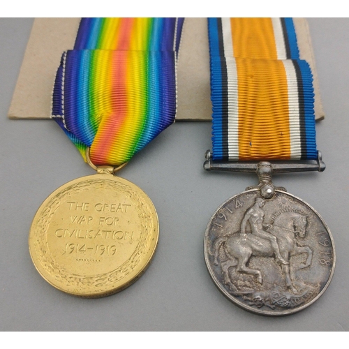 136 - WWI medal pair KING'S OWN SCOTTISH BORDERERS awarded to 12894 Pte. J. Morgan comprising British War ... 