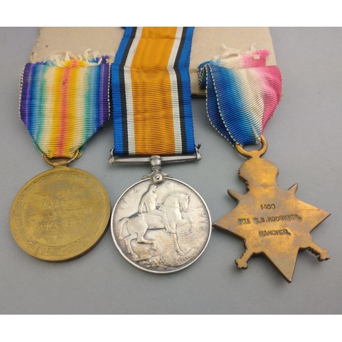 163 - WWI medal group MANCHESTER REGIMENT awarded to 1400 Pte. W. B. Hodgkiss comprising 1914-15 Star, Bri... 