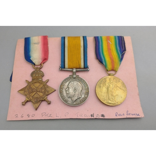 171 - WWI medal trio RIFLE BRIGADE awarded to 2608 Pte. L. P. Traine, comprising 1914-15 Star, British War... 