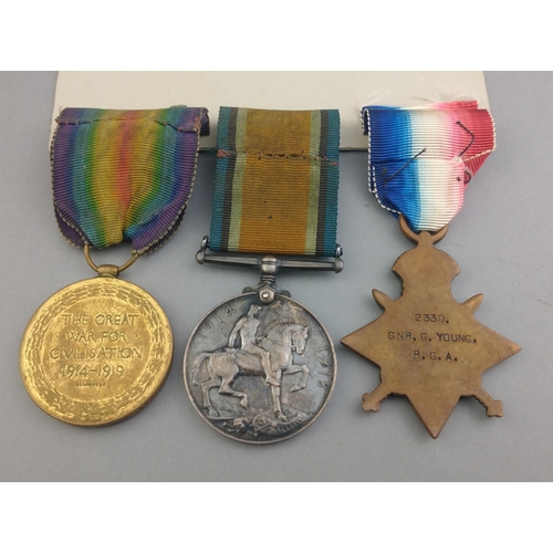 177 - WWI medal trio - ROYAL GARRISON ARTILLERY - ROYAL ARTILLERY awarded to 2330 Gnr. G. Young comprising... 