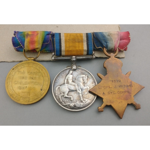 214 - WWI medal trio ARMY CYCLING CORPS awarded to 1579 L.Cpl. J. Wright comprising 1914-15 Star, British ... 