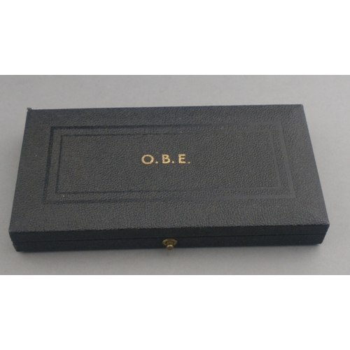 261 - Cased OBE in Royal Mint box with hallmarks for London 1919.#272