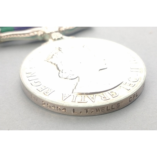 338 - ELIZABETH II GSM General Service Medal with Northern Ireland clasp awarded to RM25454 L. T. Wells RO... 