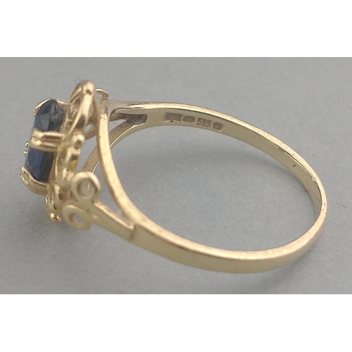 1 - A lovely 14K 585 stamped ring with pretty blue centre stone. Size K, gross weight 1.6g approx.  In a... 