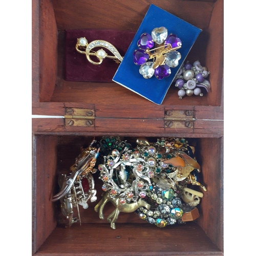 83 - Two wooden jewellery boxes, one with a brass cherub on the lid (17 x 12 x 9cm approx), plus one Orie... 