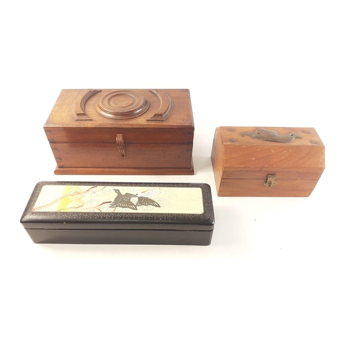 83 - Two wooden jewellery boxes, one with a brass cherub on the lid (17 x 12 x 9cm approx), plus one Orie... 