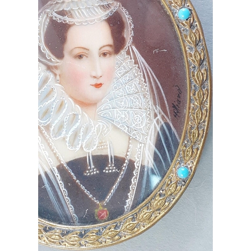 100 - A miniature framed portrait. Likely a representation of Mary Queen of Scots. 7cm excluding suspensio... 