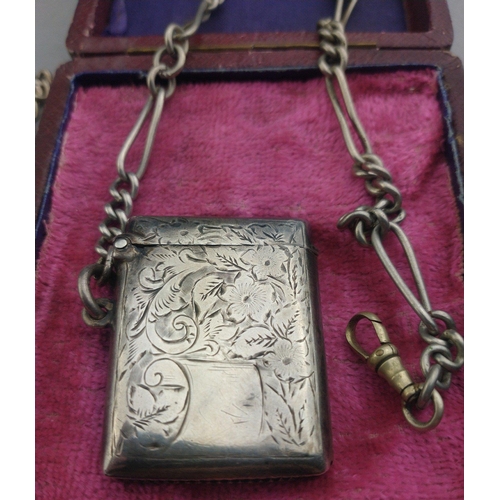 104 - A nice silver hallmarked Vesta case on a plated chain. Also two silver fob medals. 43g approx.#104... 