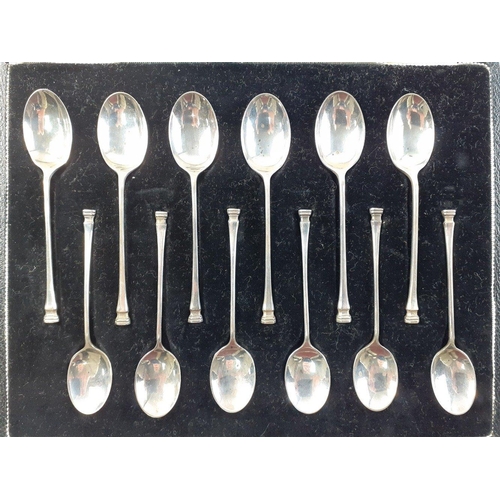 113 - A set of 12 silver coffee spoons hallmarked Sheffield 1960, made by FB.  Weight 108g approx.  In lin... 