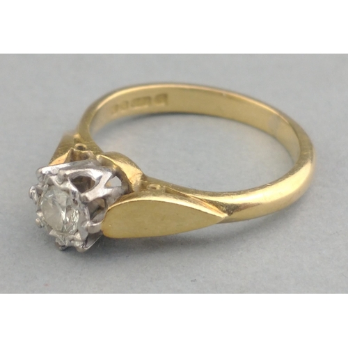 13 - A diamond (tested) solitaire ring stamped 750, stone measures approx 5mm, size J.  Gross weight 3.62... 