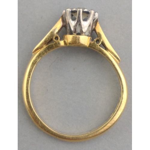 13 - A diamond (tested) solitaire ring stamped 750, stone measures approx 5mm, size J.  Gross weight 3.62... 