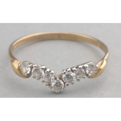 19 - A 375 fully hallmarked ring set with wishbone shaped cubic zirconias, size R, gross weight 1.12g app... 