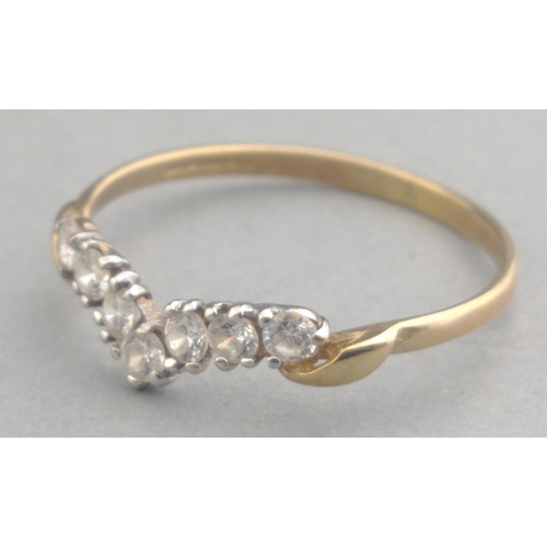 19 - A 375 fully hallmarked ring set with wishbone shaped cubic zirconias, size R, gross weight 1.12g app... 