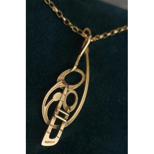 23 - A beautiful pendant and necklace stamped 375, pendant measures 4cm approx and chain 40cm approx, wei... 