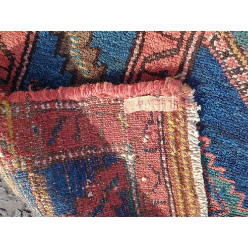 237 - STUNNING QUALITY! A bright blue and red top quality Kurdish woolwork carpet  Measures 170cm x 130cm.... 