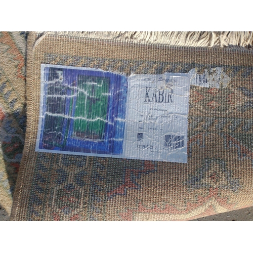 238 - A useful Turkish runner in neutral colours. Size 320cm x 70cm in overall good condition.#237