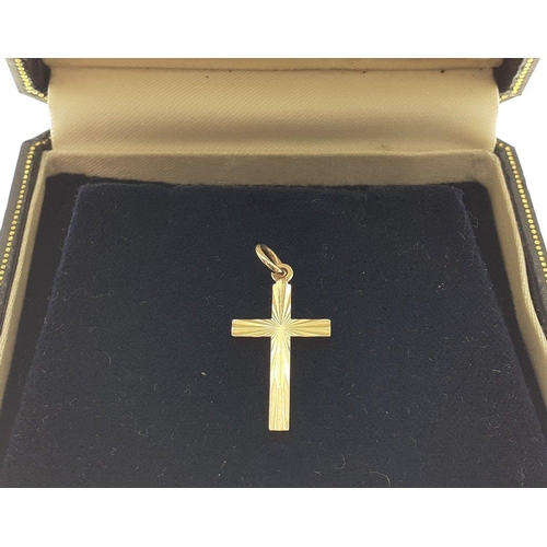 24 - A 9ct marked gold crucifix, 23mm approx, weight 0.35g approx#24