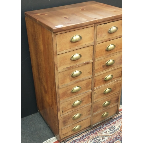 256 - A set of drawers with 14 drawers with brass drawer handles.  New top has been added.  Stands H92 x W... 