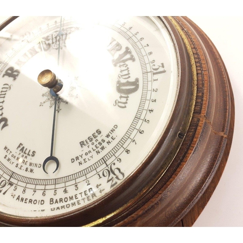 288 - A lovely large banjo style aneroid barometer with thermometer in neck. 73cm tall.  Minor crack in th... 