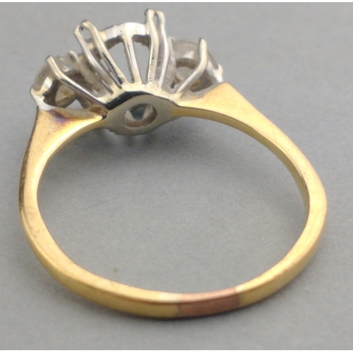 3 - An unmarked yellow metal ring mount with missing centre stone.  The two side stones each approx 3mm ... 