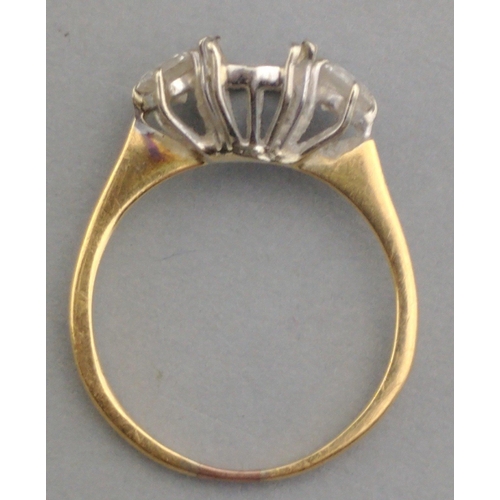 3 - An unmarked yellow metal ring mount with missing centre stone.  The two side stones each approx 3mm ... 