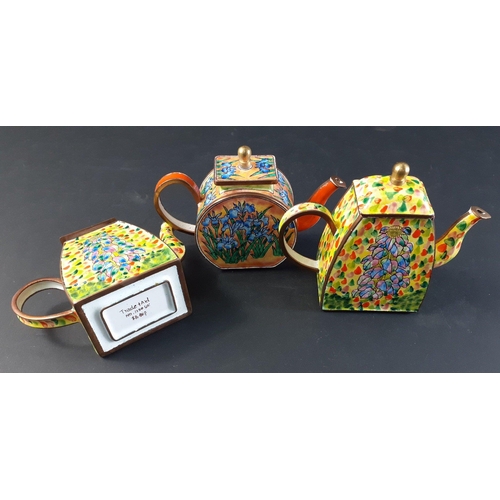 303 - Three vintage TRADE + AID enamel teapots - 1 round 8cm (no 735) and 2 others 9cm high (nos. 1103 and... 