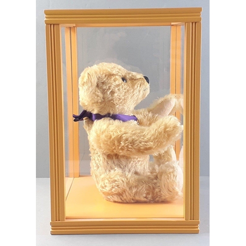 313 - A STEIFF teddy bear with button in ear with PISCES label on a ribbon.  Stands 27cm tall approx.  Com... 