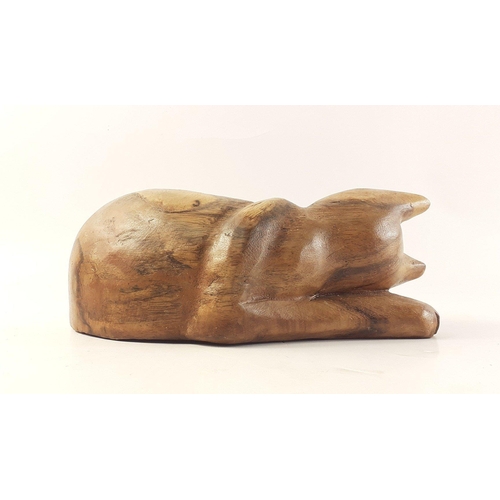 339 - A wooden cat in a restful pose, approx 23cm long#339