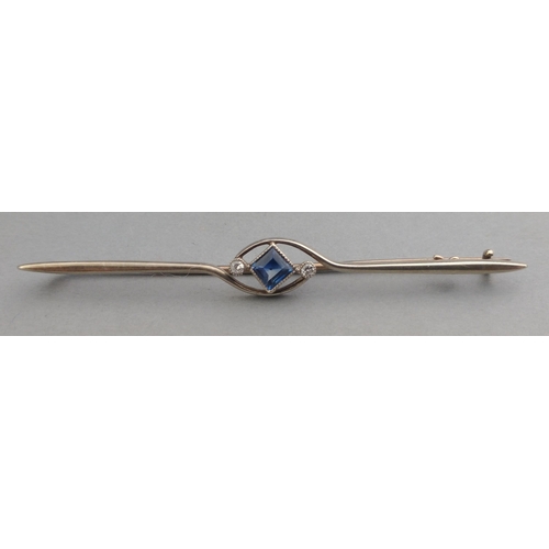 34 - An unmarked white metal pin bar brooch ART DECO styled with two supporting diamonds (tested) with a ... 