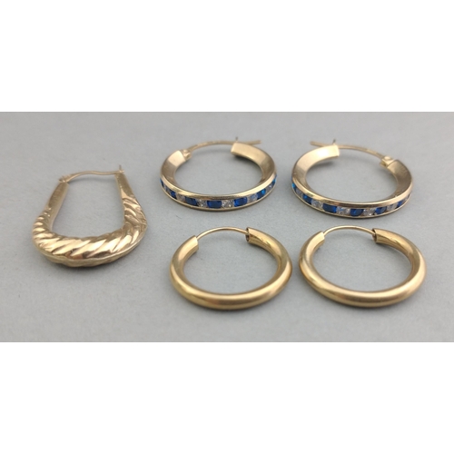 36 - A pair of 375 stamped hoop style earrings with white and blue stones inset and another set of yellow... 